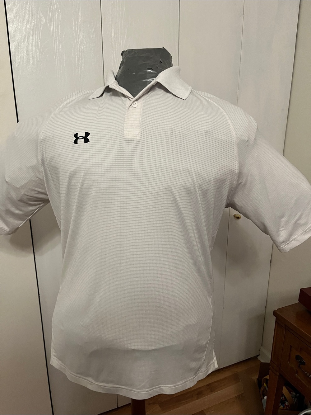 Under Armour light tan/cream Short-Sleeve Polo with Black Logo